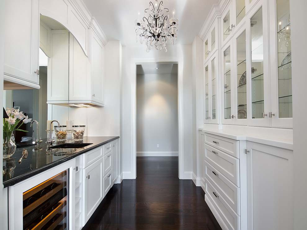 Elegant enclosed kitchen photo in Denver