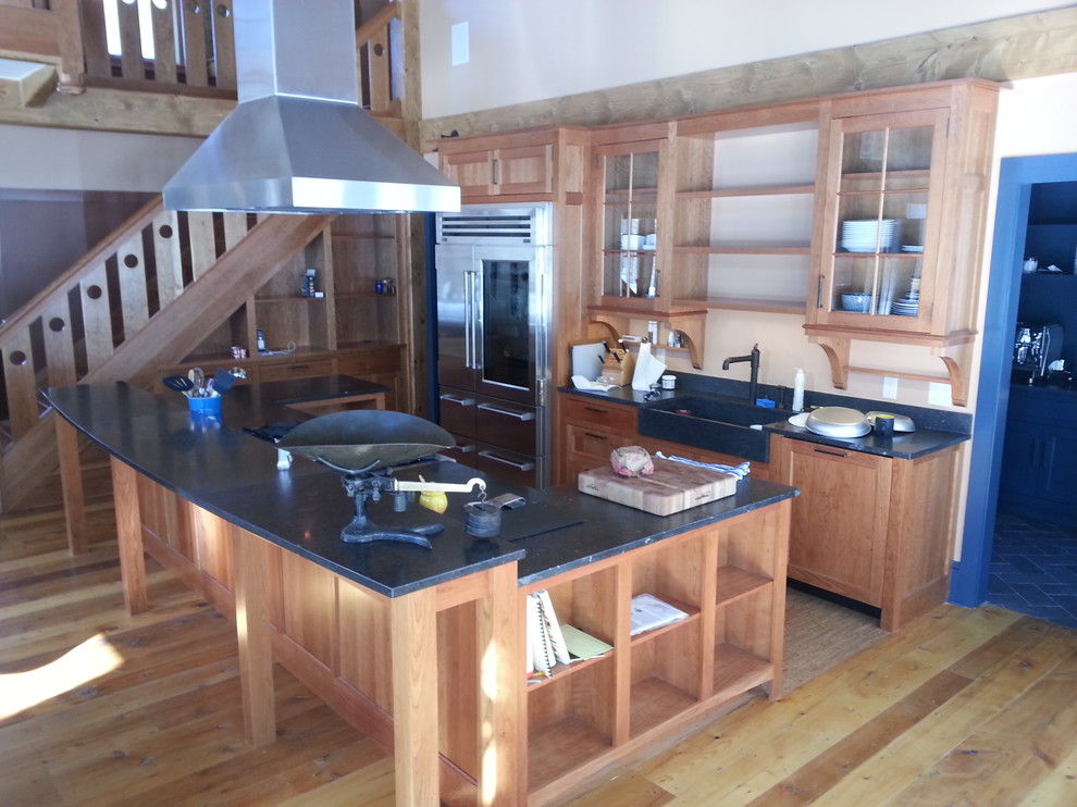 Example of a large arts and crafts u-shaped light wood floor eat-in kitchen design in Burlington with recessed-panel cabinets, marble countertops, stone slab backsplash, stainless steel appliances, an island, an undermount sink, light wood cabinets, white backsplash and white countertops