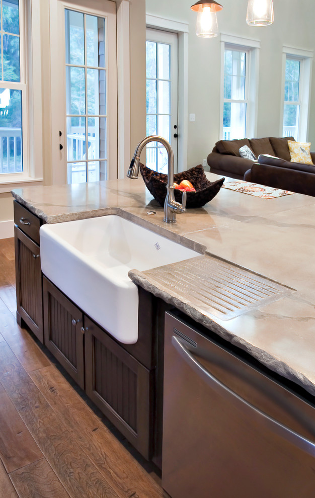 Elegant kitchen photo in Charleston with concrete countertops