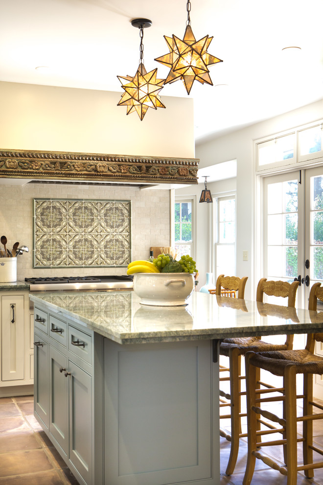 Example of a classic kitchen design in Los Angeles with an island