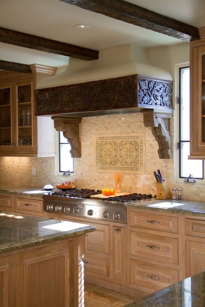 Kitchen - mediterranean kitchen idea in Los Angeles with granite countertops