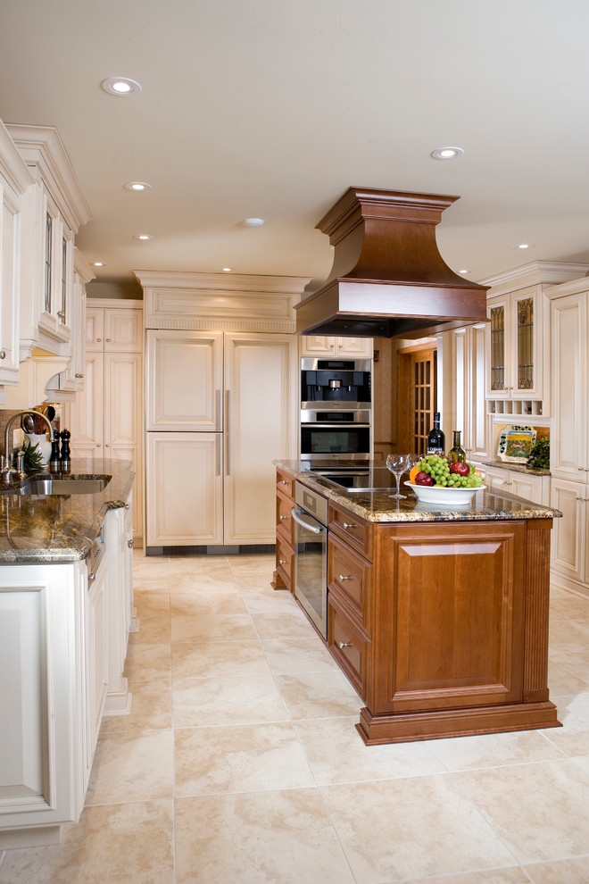 Inspiration for a medium sized traditional u-shaped kitchen/diner in Toronto with a submerged sink, raised-panel cabinets, beige cabinets, granite worktops, brown splashback, integrated appliances and an island.
