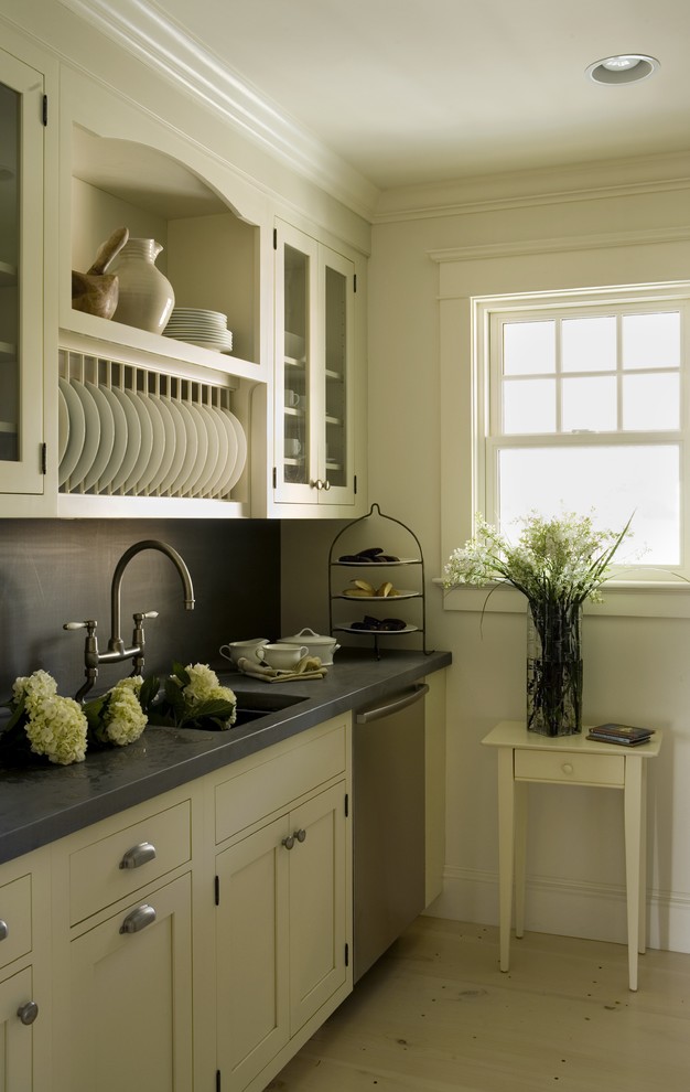 Trendy kitchen photo in Providence with glass-front cabinets