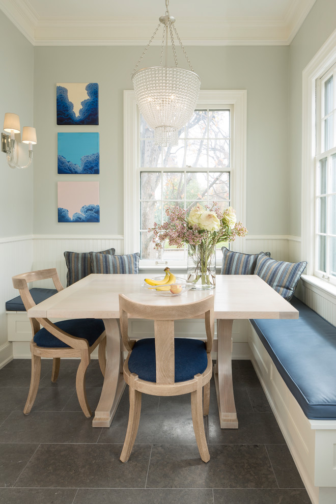 Inspiration for a timeless brown floor dining room remodel in Denver