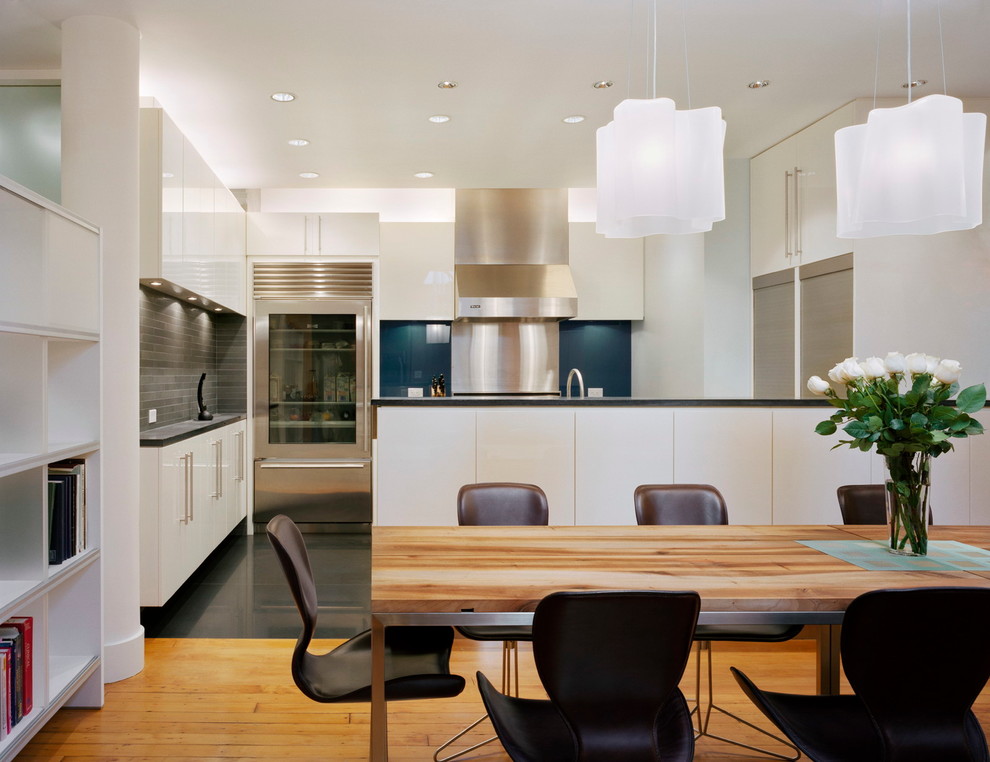 Example of a mountain style kitchen design in New York with stainless steel appliances