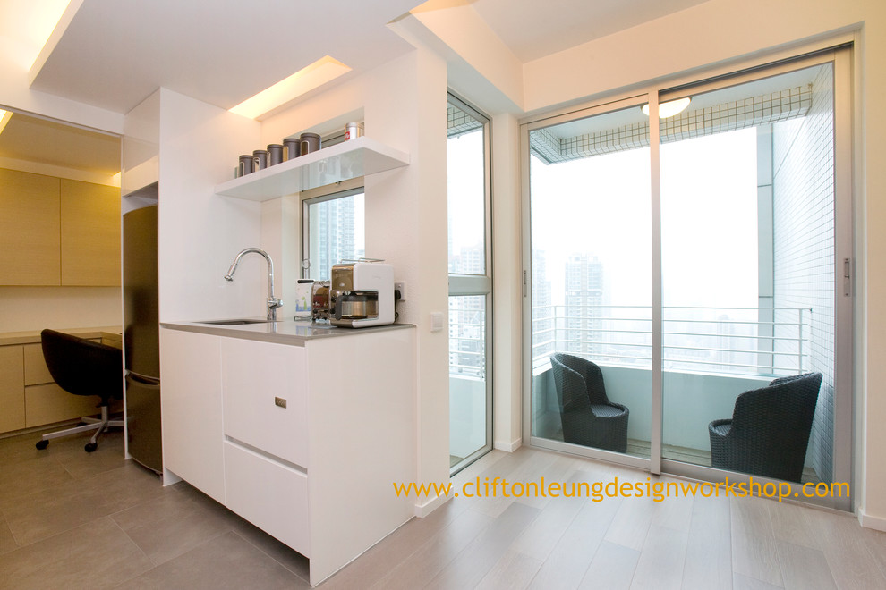 Example of a trendy kitchen design in Hong Kong
