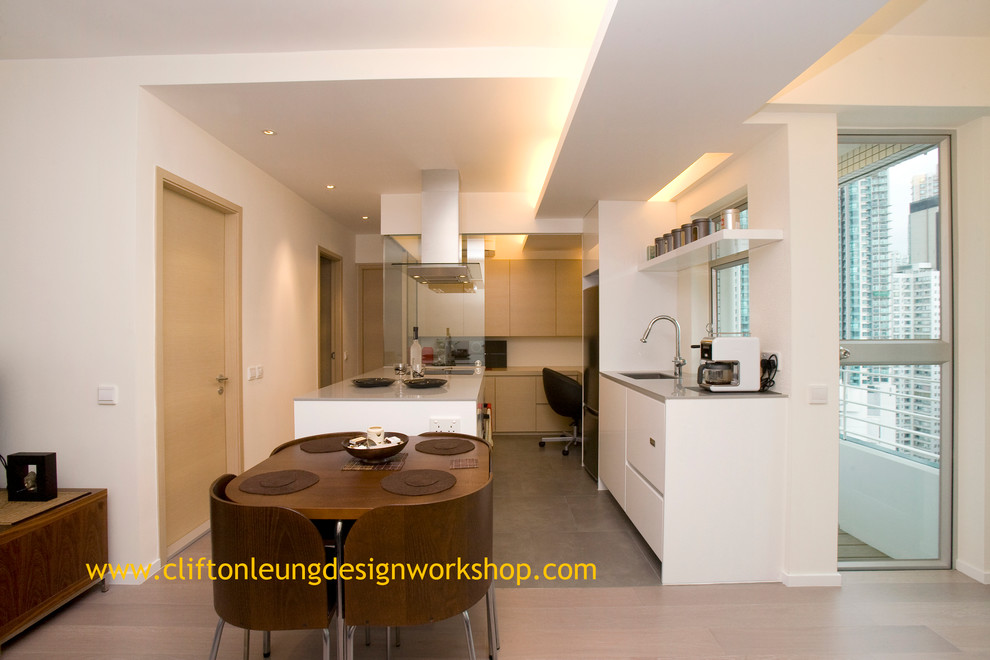 Example of a trendy kitchen design in Hong Kong