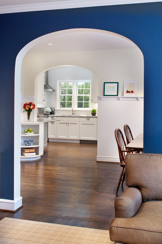 Inspiration for a timeless galley kitchen remodel in DC Metro with shaker cabinets, white cabinets, marble countertops, white backsplash, subway tile backsplash and stainless steel appliances