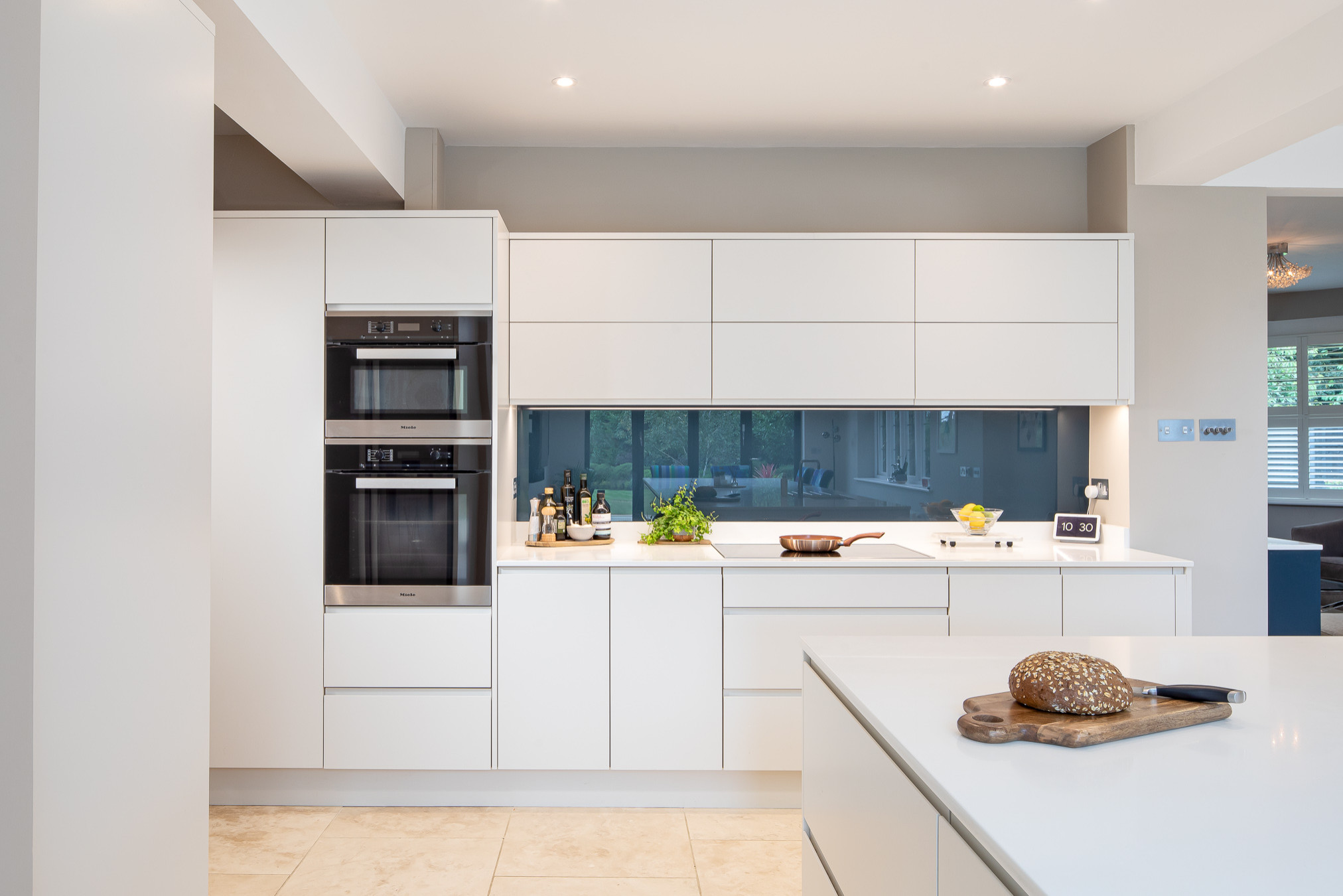 Westlake Contemporary White Kitchen With Aqua Backsplash - UB