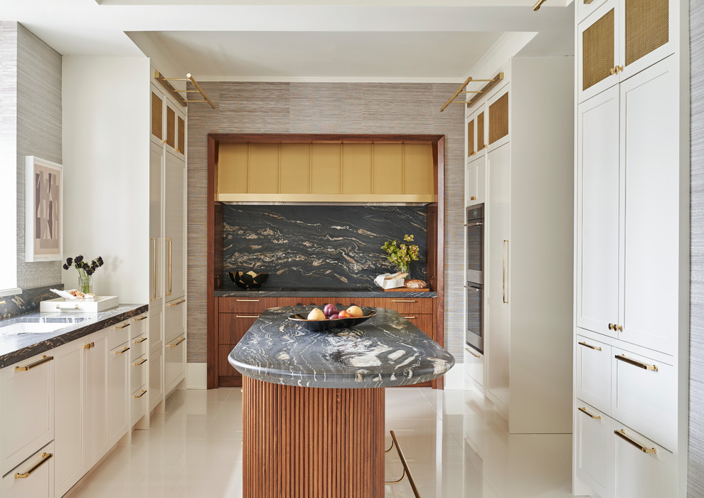 Eat-in kitchen - contemporary u-shaped ceramic tile and white floor eat-in kitchen idea in Chicago with shaker cabinets, white cabinets, quartzite countertops, black backsplash, stone slab backsplash, stainless steel appliances, an island, black countertops and an undermount sink