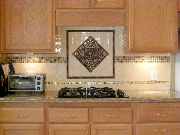 Example of a classic single-wall eat-in kitchen design in Los Angeles with recessed-panel cabinets and light wood cabinets