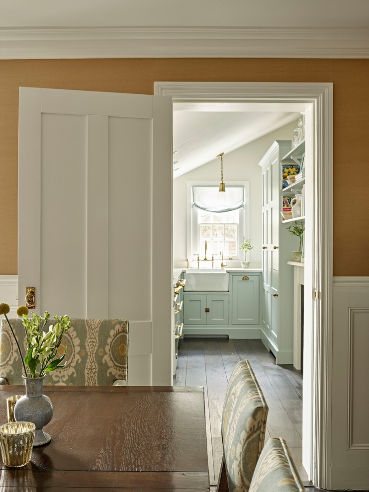 Design ideas for a small traditional kitchen in London.