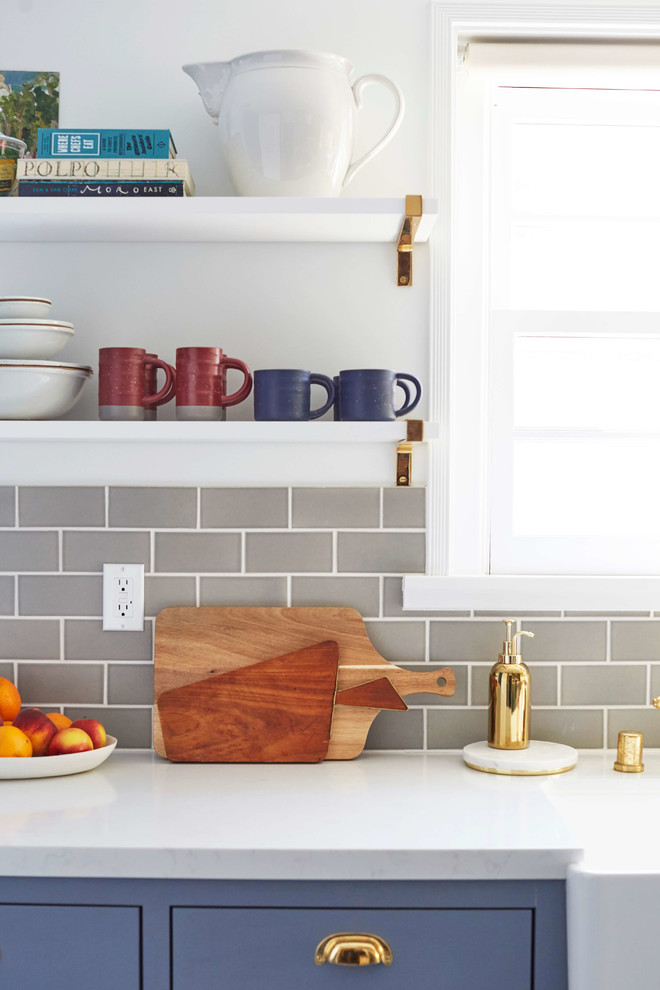 Inspiration for an eclectic cement tile floor kitchen remodel in San Francisco with blue cabinets, gray backsplash and ceramic backsplash