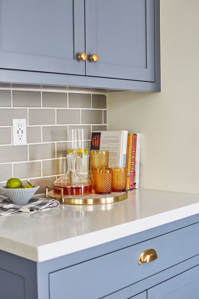 Kitchen - eclectic cement tile floor kitchen idea in San Francisco with blue cabinets, gray backsplash and ceramic backsplash