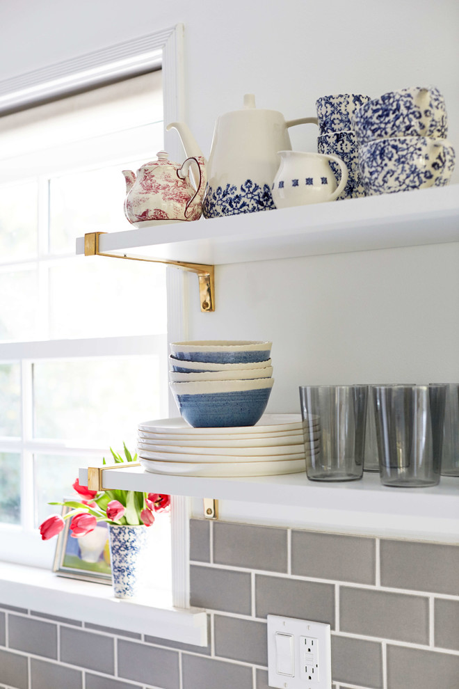 Eclectic cement tile floor kitchen photo in San Francisco with blue cabinets, gray backsplash and ceramic backsplash
