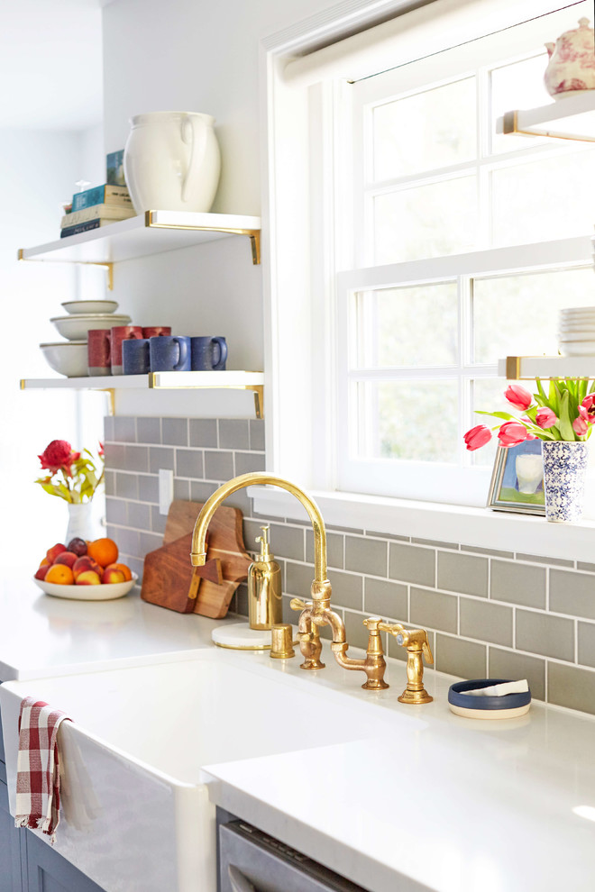 Eclectic cement tile floor kitchen photo in San Francisco with blue cabinets, gray backsplash and ceramic backsplash