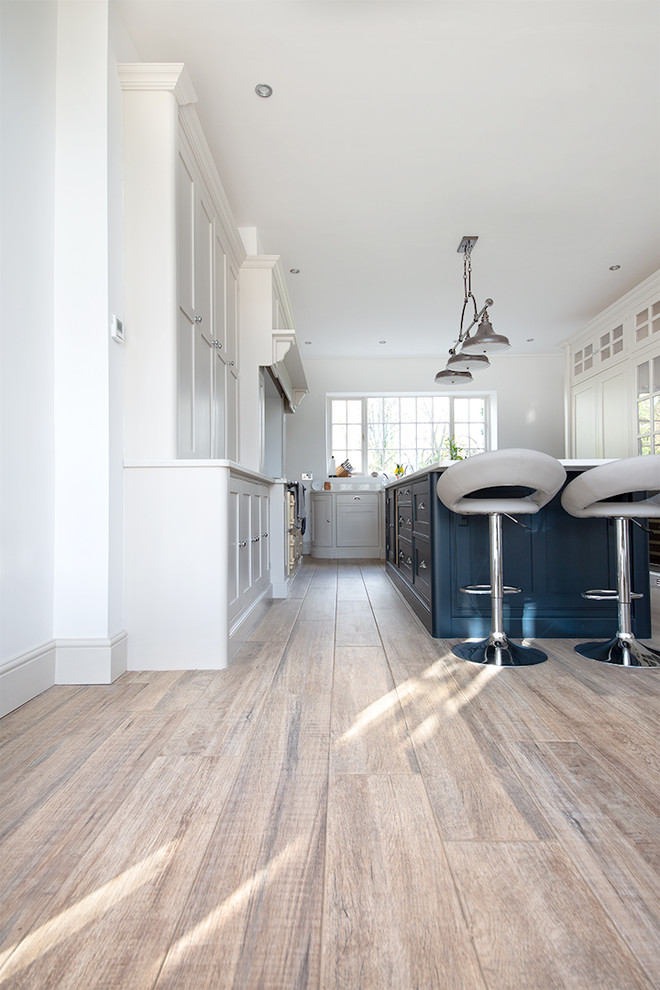 Inspiration for a medium sized farmhouse kitchen in Other with porcelain flooring.