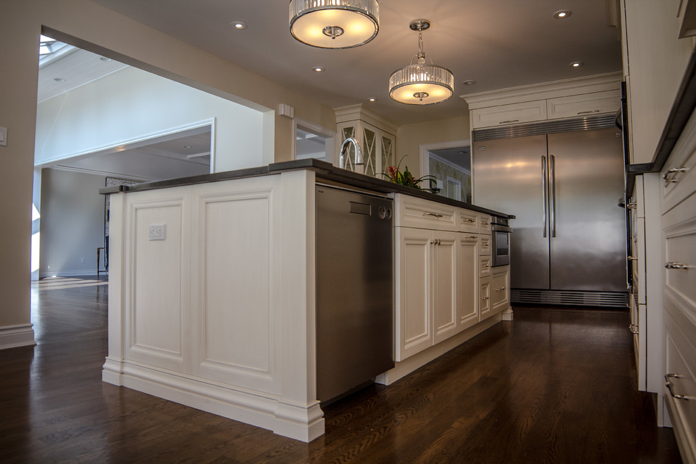 Classic Cream Kitchen with Green Accents Contemporary Kitchen