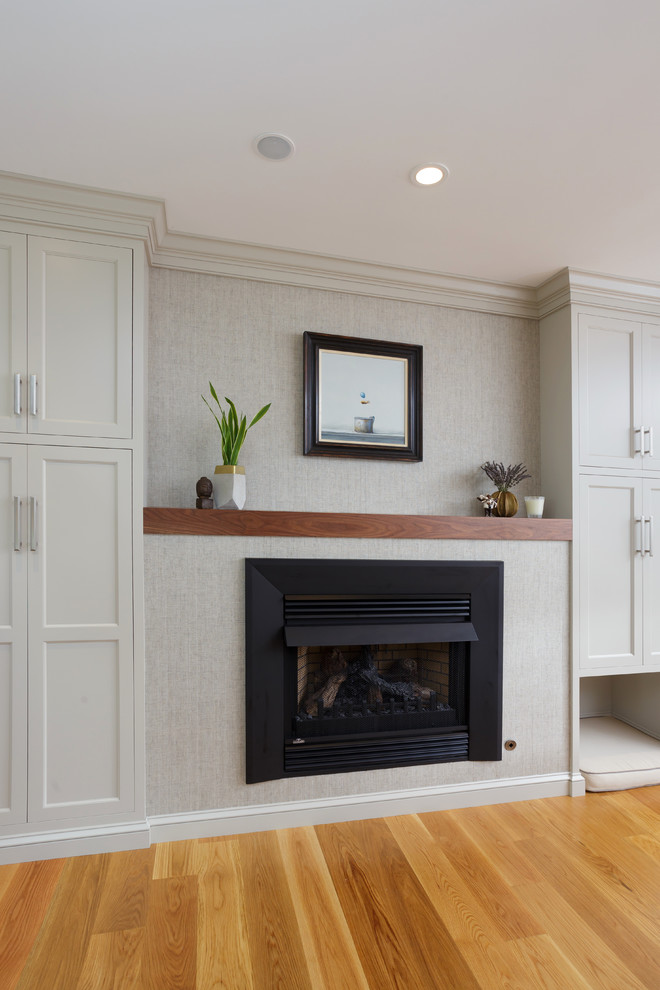 Inspiration for a large timeless u-shaped light wood floor and beige floor enclosed kitchen remodel in Philadelphia with an undermount sink, recessed-panel cabinets, white cabinets, marble countertops, white backsplash, marble backsplash, paneled appliances and two islands