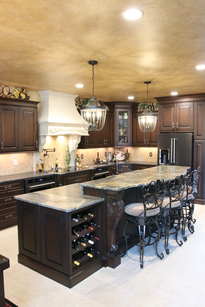 Classic Upscale Kitchen with Unique Granite Island Mediterranean