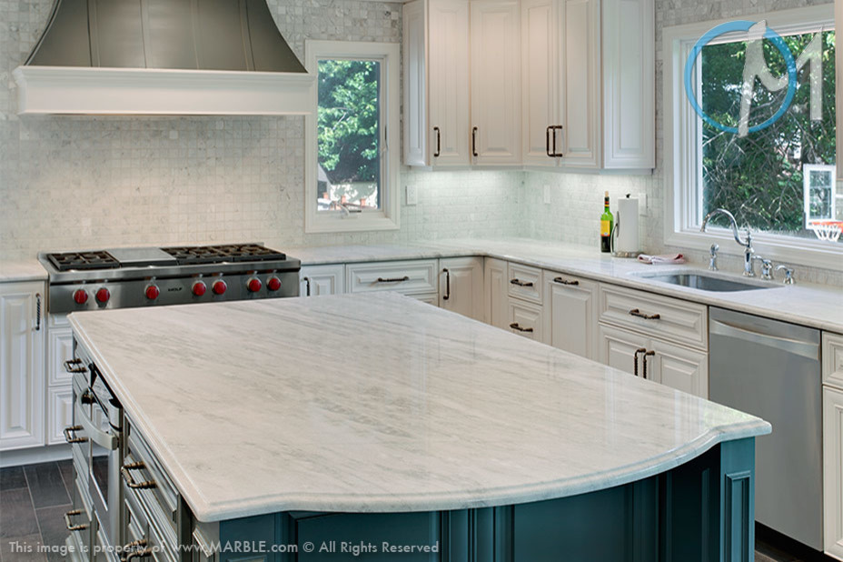 Inspiration for a large contemporary l-shaped eat-in kitchen remodel in New York with an undermount sink, white cabinets, quartzite countertops, white backsplash, stainless steel appliances and an island