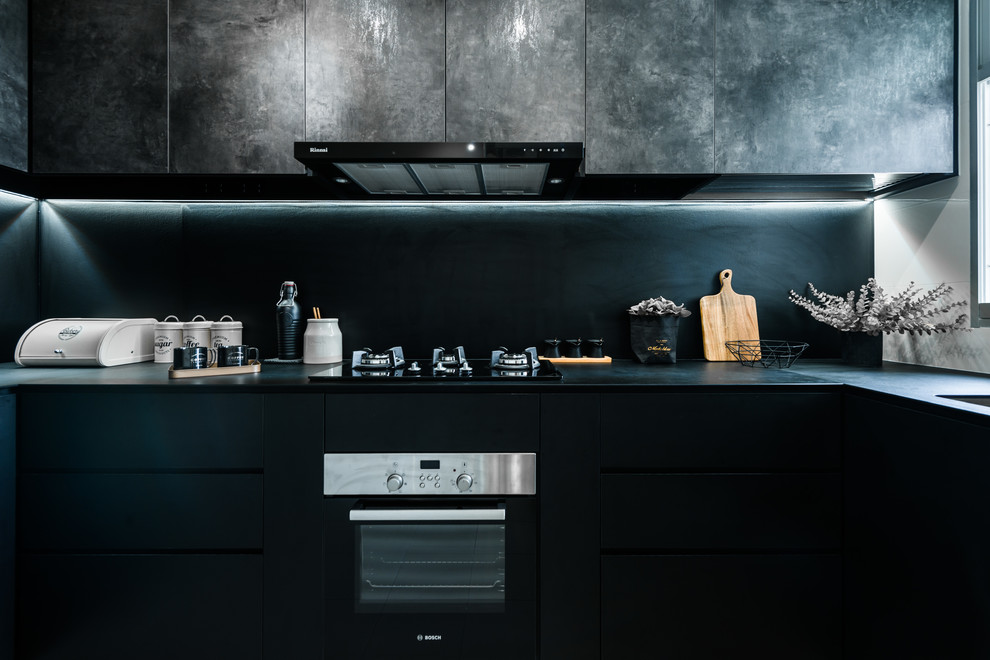 Inspiration for an industrial kitchen remodel in Singapore