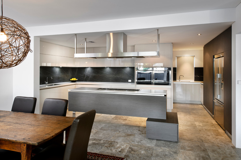 Inspiration for a contemporary u-shaped kitchen/diner in Perth with a submerged sink, flat-panel cabinets, white cabinets, black splashback, stainless steel appliances and an island.