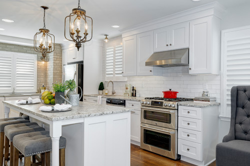 Tonal kitchen with Alaska White granite countertops