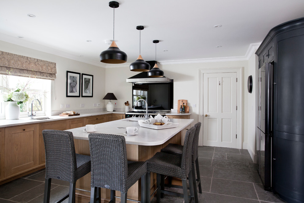 Example of a transitional kitchen design in Dublin