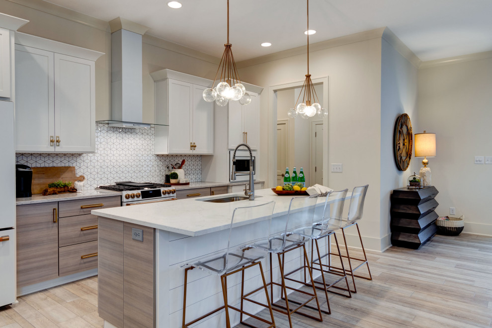 Inspiration for a mid-sized contemporary single-wall vinyl floor and multicolored floor kitchen pantry remodel in Indianapolis with an undermount sink, shaker cabinets, white cabinets, granite countertops, white backsplash, ceramic backsplash, white appliances, an island and white countertops
