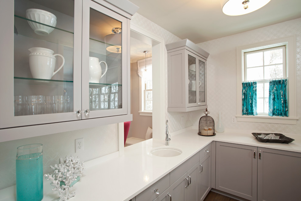 Inspiration for a coastal kitchen remodel in Minneapolis with glass-front cabinets
