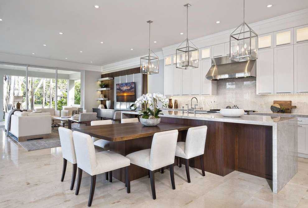 Inspiration for an expansive contemporary l-shaped kitchen in Miami with flat-panel cabinets and multiple islands.