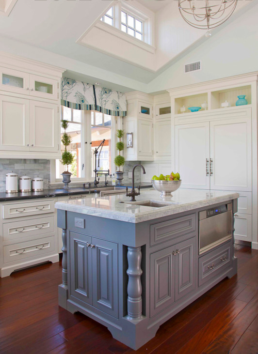 Enclosed kitchen - large traditional u-shaped medium tone wood floor and brown floor enclosed kitchen idea in San Diego with a farmhouse sink, beaded inset cabinets, white cabinets, marble countertops, gray backsplash, stone tile backsplash, an island and paneled appliances