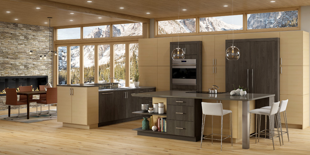 Eat-in kitchen - large contemporary l-shaped light wood floor eat-in kitchen idea in Providence with a drop-in sink, flat-panel cabinets, beige cabinets, solid surface countertops, beige backsplash, ceramic backsplash, stainless steel appliances and an island