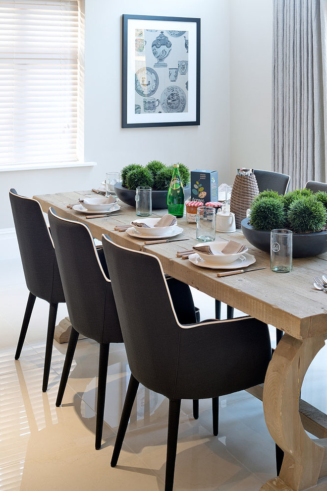 Photo of a contemporary dining room in Surrey.