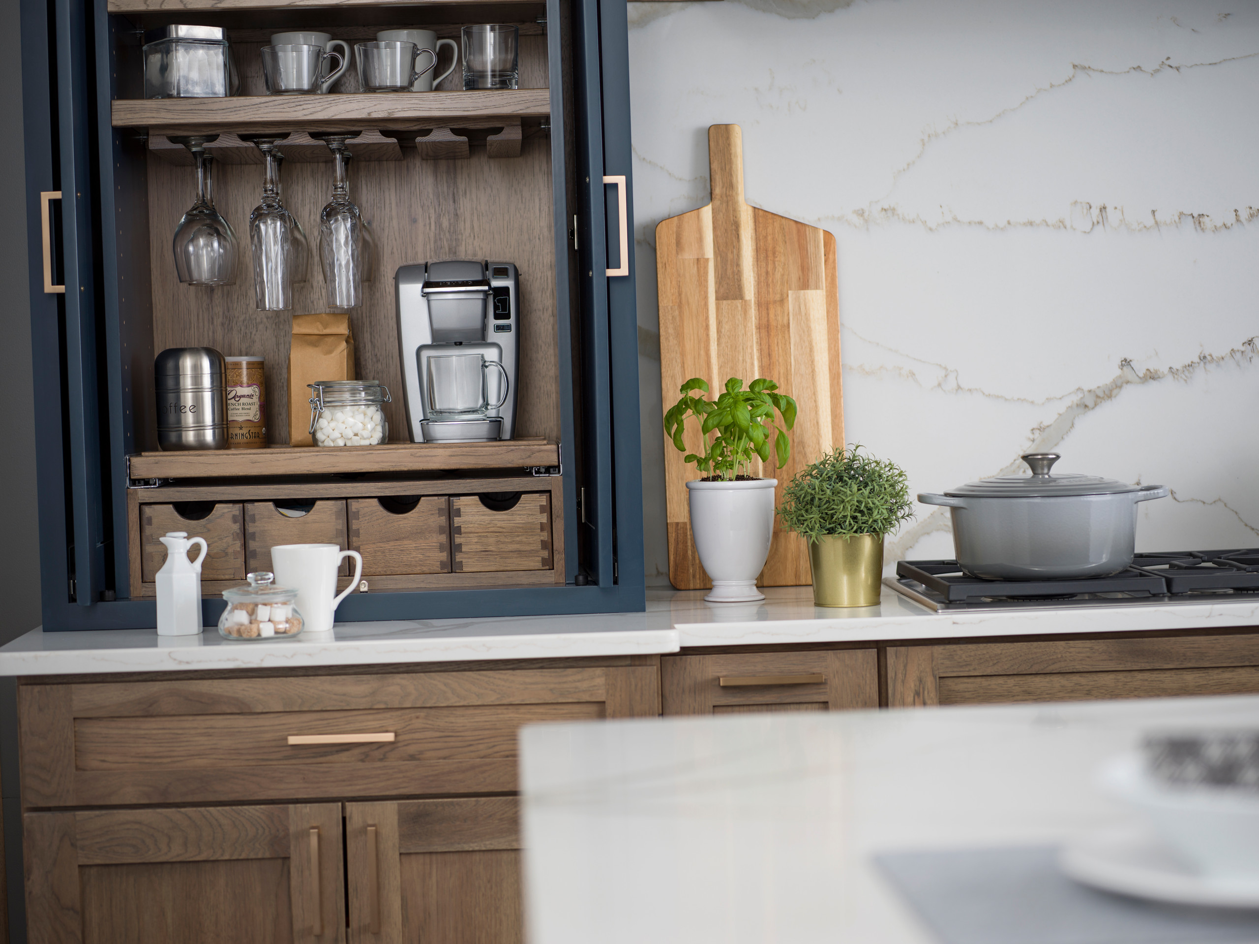 Coffee Mug In Modern Trendy Kitchen With Grey Cupboards And Wood