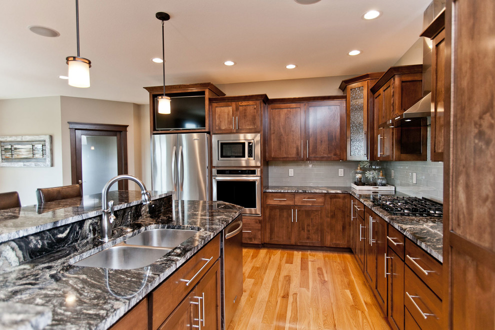 Example of an arts and crafts kitchen design in Cedar Rapids