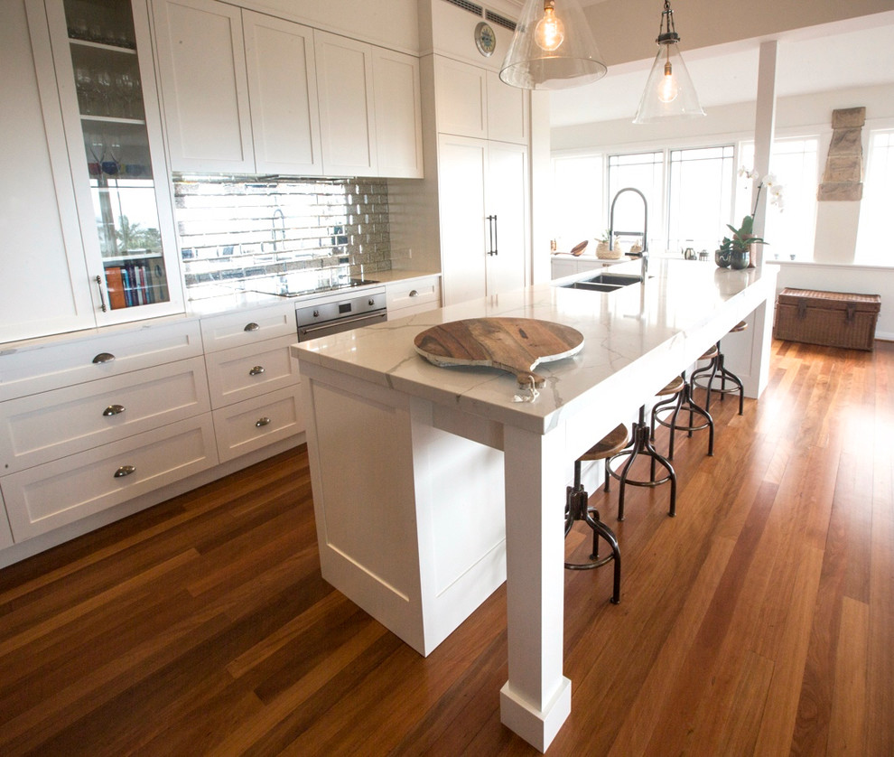 Example of a trendy kitchen design in Sydney