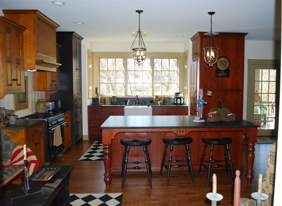 This is an example of a farmhouse u-shaped kitchen/diner in Cincinnati.