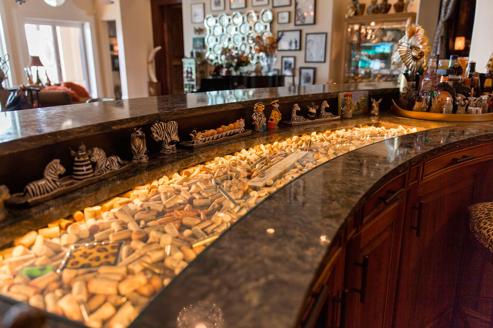 Inspiration for a large eclectic single-wall cork floor open concept kitchen remodel in Tampa with a double-bowl sink, beaded inset cabinets, medium tone wood cabinets, marble countertops, gray backsplash, stone slab backsplash, paneled appliances and two islands