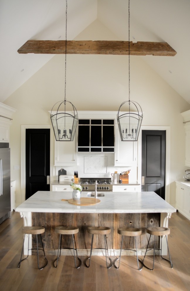 Transitional u-shaped open concept kitchen photo in Toronto with recessed-panel cabinets and white cabinets