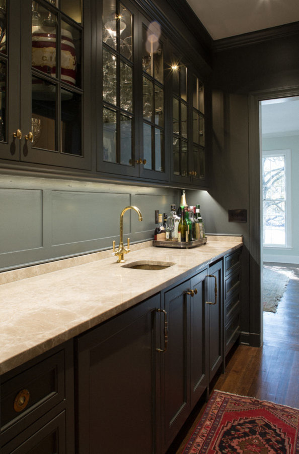 Medium sized traditional galley kitchen pantry in Other with a submerged sink, glass-front cabinets, black cabinets, granite worktops and dark hardwood flooring.