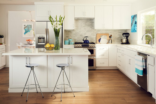 Bright white kitchen with island and two stools — inspiration for Scratch-Resistant Melamine cabinetry