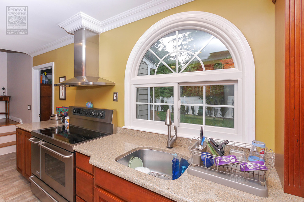 Colorful, Contemporary Kitchen with New Sliding Window and Circle-Top