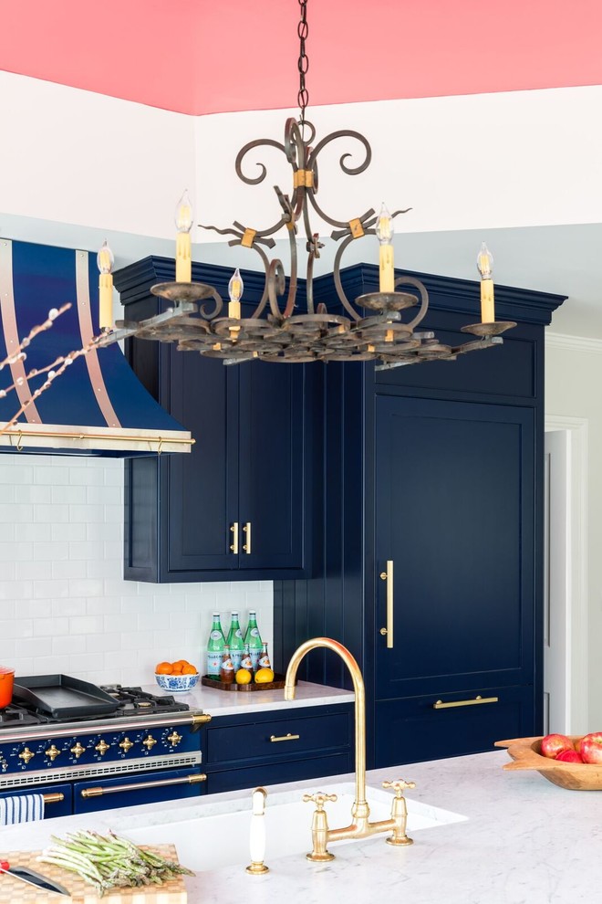 Kitchen - transitional kitchen idea in Boston with an undermount sink, shaker cabinets, blue cabinets, white backsplash, subway tile backsplash, colored appliances and an island