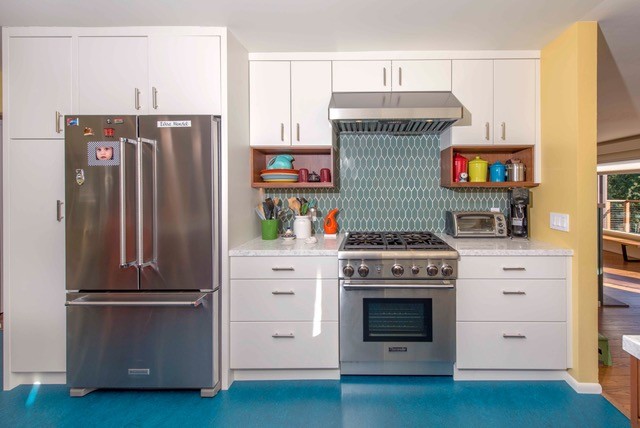 Kitchen - eclectic blue floor kitchen idea in San Francisco with an undermount sink, flat-panel cabinets, medium tone wood cabinets, quartz countertops, green backsplash, ceramic backsplash and stainless steel appliances