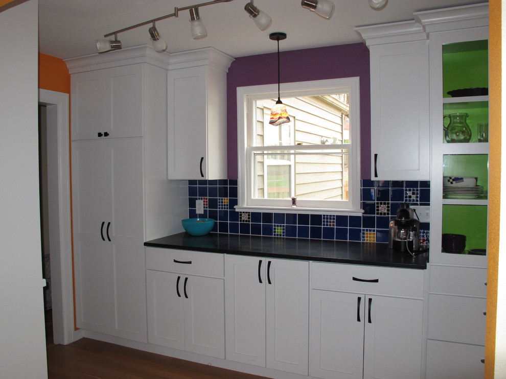 Example of an eclectic kitchen design in Cedar Rapids