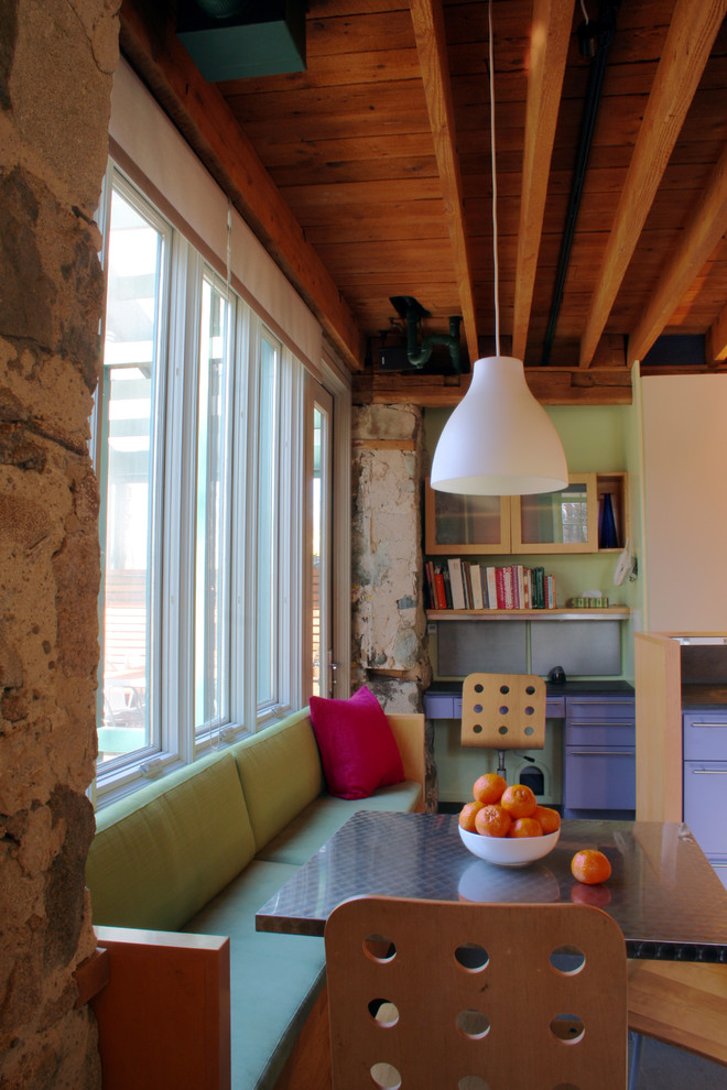 Eat-in kitchen - industrial eat-in kitchen idea in Boston