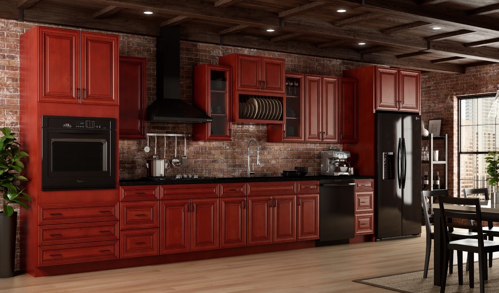 Eat-in kitchen - mid-sized traditional single-wall light wood floor eat-in kitchen idea in Cleveland with an undermount sink, raised-panel cabinets, red cabinets, multicolored backsplash, black appliances and no island