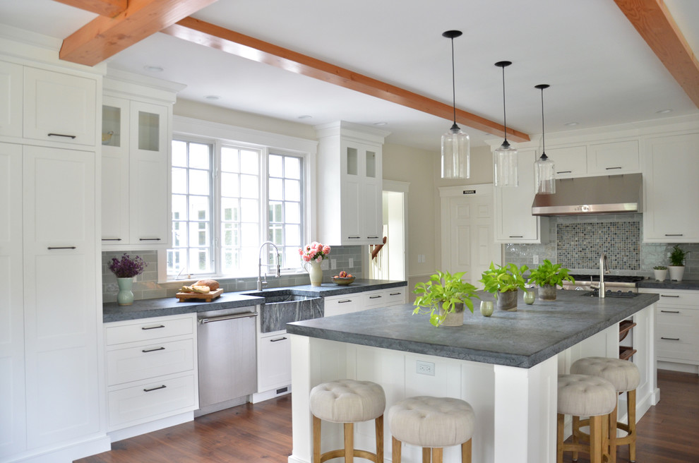 Inspiration for a transitional dark wood floor kitchen remodel in Boston with recessed-panel cabinets, white cabinets and soapstone countertops